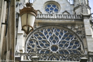 old street light and the rose window at sainte chapelle cathedral in paris 1225